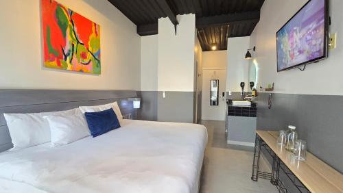 Cama ou camas em um quarto em Hotel NEXT