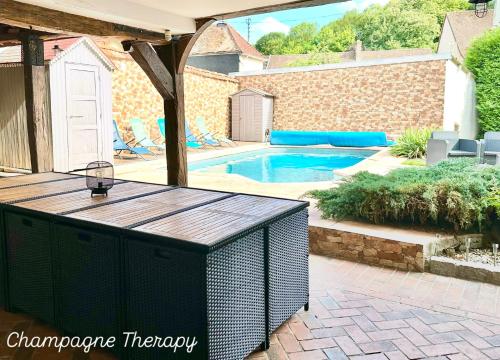 Πισίνα στο ή κοντά στο Champagne Therapy Demeure de charme avec piscine et SPA - 7 chambres