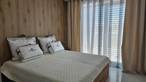 Postel nebo postele na pokoji v ubytování Moderný apartmán 2 s veľkou terasou