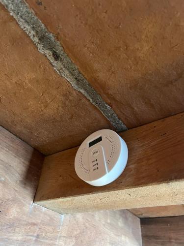 a white object sitting on top of a ceiling at Casa Momento - Retiro frente al mar con Starlink en Ventanilla in Zapote