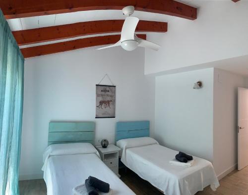 Ένα ή περισσότερα κρεβάτια σε δωμάτιο στο Casa La Jordana