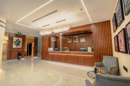 a lobby of a hospital with a waiting room at Grand Line Hotel in Tabuk