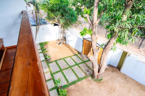 an overhead view of a tree in a house at Captains Cabins Arugambay in Arugam Bay