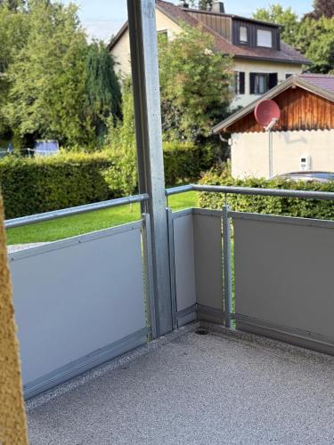 a view from a balcony with sliding doors at Villa19hundert5 moderne Ferienwohnungen in zentraler Lage in Lindenberg im Allgäu