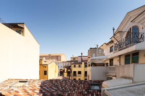 a view of a city street with buildings at Ca' Cesarino in Chioggia
