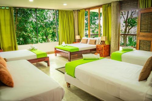 Un ou plusieurs lits dans un hébergement de l'établissement Ekoparque Lunaforest