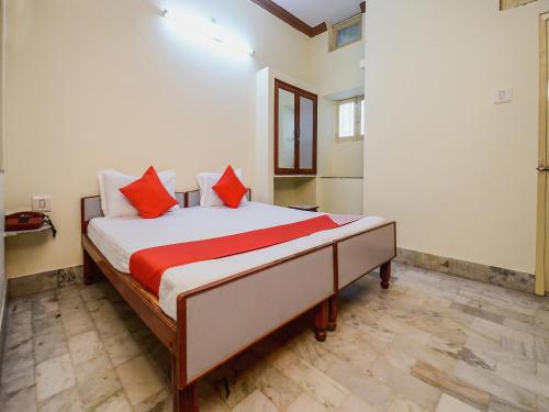 Ένα ή περισσότερα κρεβάτια σε δωμάτιο στο Super Hotel O Anand Hotel Jodhpur