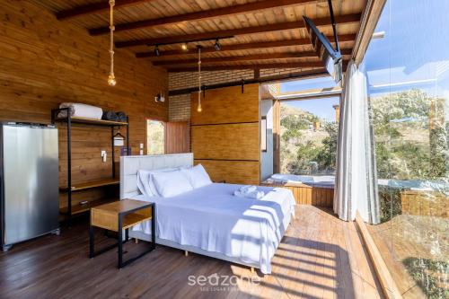 Balkoni atau teres di Chalé Charmoso c/ Jacuzzi de Hidromassagem VST024
