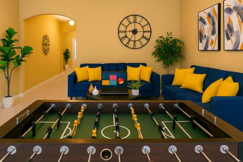 a living room with a pool table with baseball bats at One Level Home, Foosball, Crib, Office Space,yard in Crowley