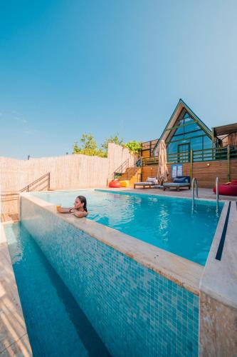 a person in a swimming pool at tetova in Sapanca