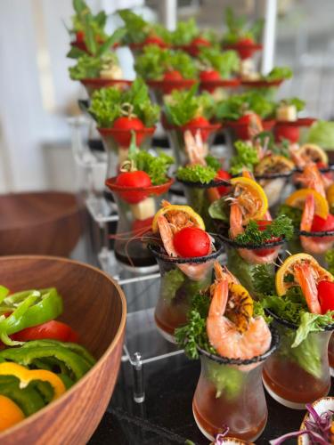 a bunch of dishes of food on a buffet at Hotel Babylon Royal in Ringsheim
