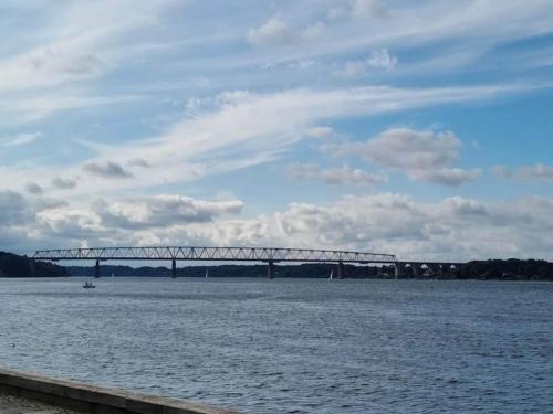 a large bridge over a large body of water at 10 person holiday home in Bogense-By Traum in Bogense
