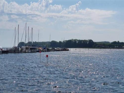 a large body of water with boats in it at 6 person holiday home on a holiday park in Hejls in Hejls