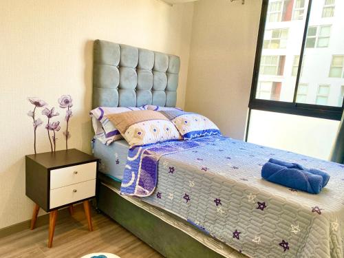 Postel nebo postele na pokoji v ubytování Departamento exclusivo con vista a la ciudad