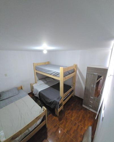 Postel nebo postele na pokoji v ubytování In house ica