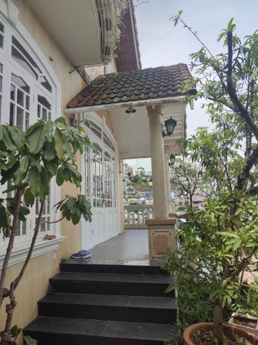 a front door of a house with a porch at Tiên Hoa Sơn Villa in Da Lat