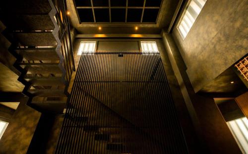 an overhead view of an escalator in a building at 平戸城 CASTLE STAY 懐柔櫓 - Hirado Castle Stay Kaijuyagura- in Hirado