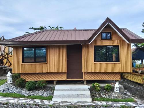 a rendering of a tiny house at Seabreeze Beachfront Home and Cottages new management in San Juan