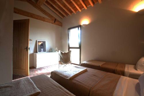 Ένα ή περισσότερα κρεβάτια σε δωμάτιο στο Tuscany Forever Premium Apartments