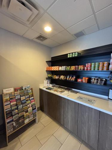 a grocery store with a counter and shelves of food at Holiday Inn Express & Suites Truth Or Consequences by IHG in Truth or Consequences