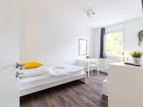 Ένα ή περισσότερα κρεβάτια σε δωμάτιο στο Nice Apartment Castrop-Rauxel