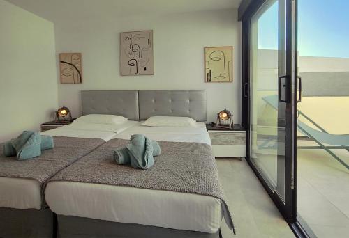 Katil atau katil-katil dalam bilik di Villa Royale Rex has got it all