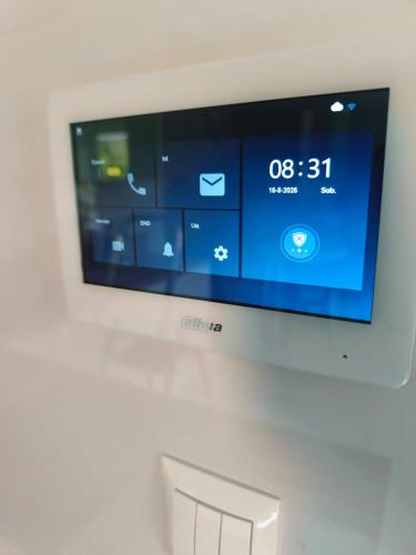 TV a/nebo společenská místnost v ubytování Blu Apartments