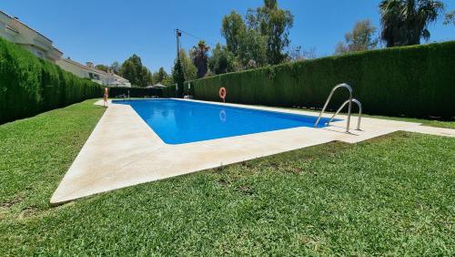 3-bedroom HOUSE with a private sunny garden and community pool in Marbella near Puerto Banús