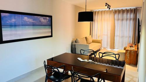 TV a/nebo společenská místnost v ubytování Apartamento Novo e Confortável em Cabo Frio