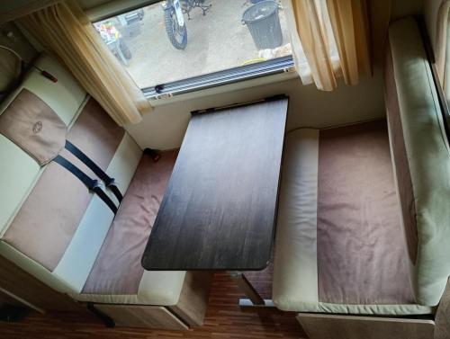 Χώρος καθιστικού στο Nuit insolite en camping-car tout confort