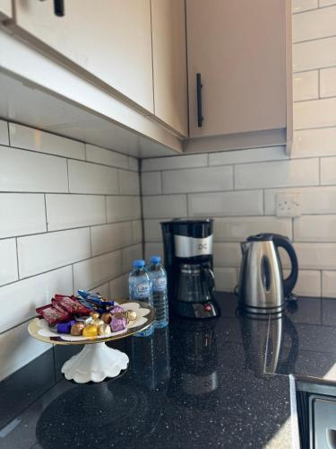 a plate of food on a counter in a kitchen at The view in Māḩiş