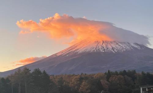 a mountain with a fire crater on top of it at Ondolphin in Narusawa