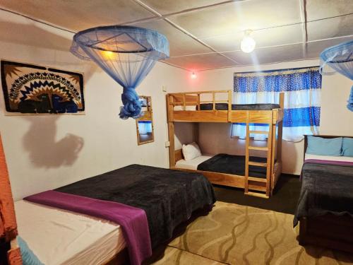 Postel nebo postele na pokoji v ubytování Misty Soul Retreat