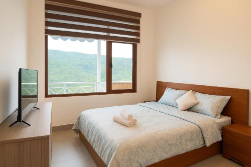 Ένα ή περισσότερα κρεβάτια σε δωμάτιο στο The ViTa Retreat
