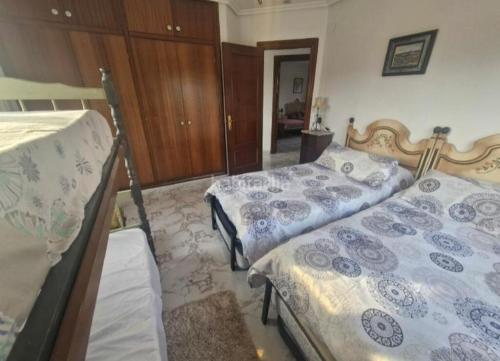 Postel nebo postele na pokoji v ubytování La Sartén