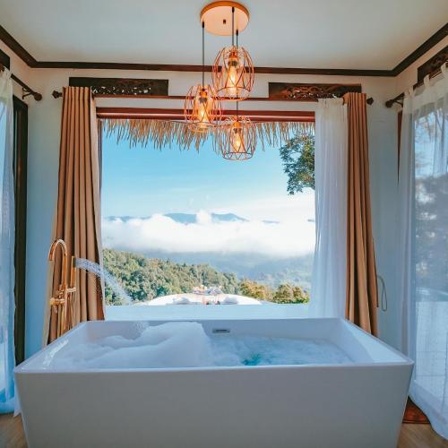 Ένα ή περισσότερα κρεβάτια σε δωμάτιο στο The heaven villa
