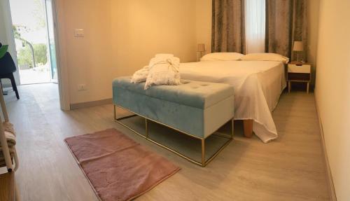 Ένα ή περισσότερα κρεβάτια σε δωμάτιο στο CASINA DAMÍ