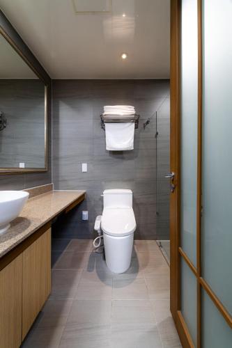 a bathroom with a toilet and a sink at Hotel Modak Namdaemun in Seoul