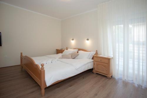 Posteľ alebo postele v izbe v ubytovaní Villa Vinka
