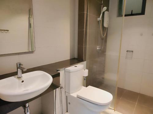 a bathroom with a toilet and a sink at New 2BR or 3BR Da Men Residence 7 Min to Sunway Near BRT in Subang Jaya