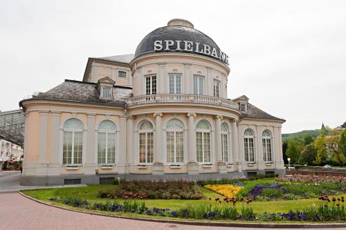 a building with a garden in front of it at BSW Ferienhotel Lindenbach in Bad Ems