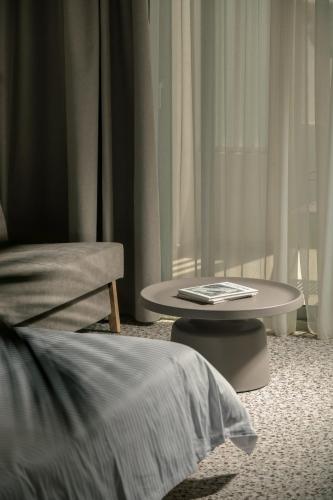 Cama o camas de una habitación en FOS Luxury Suites