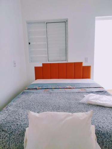 Postel nebo postele na pokoji v ubytování Pousada minha casa ouro verde