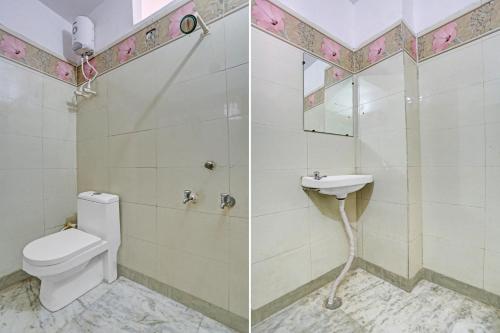 a bathroom with a toilet and a sink at Hotel O Elite Inn in Delhi