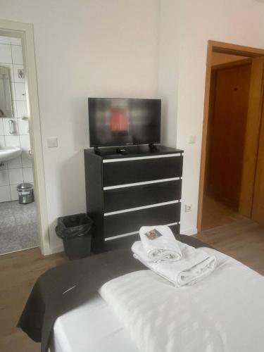 Hotel Schäferにあるテレビまたはエンターテインメントセンター