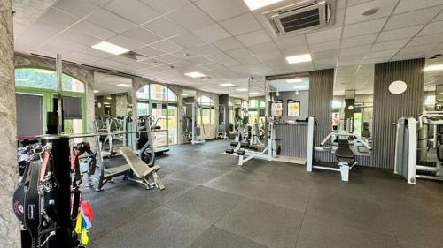 a gym with lots of equipment in a building at Flores Gardan ART Studio in Chernomorets
