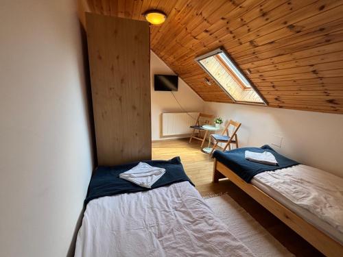 Ένα ή περισσότερα κρεβάτια σε δωμάτιο στο Nemere Apartmans