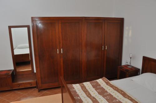 Postel nebo postele na pokoji v ubytování Apartments Miana