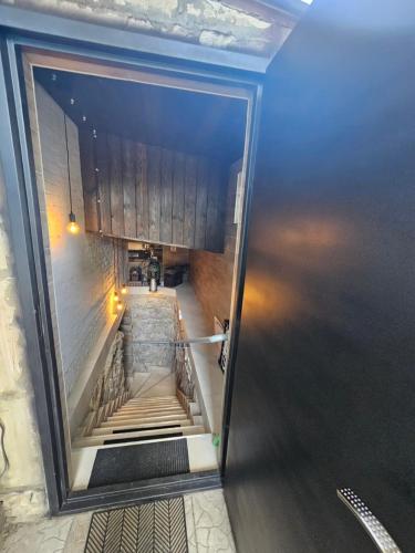 a view of a stairwell in a building at 46 Loft apartment with king-size bed in Chernihiv