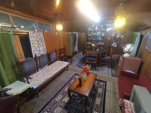 an aerial view of a living room in a train car at Kashmir View group of Houseboat in Srinagar
